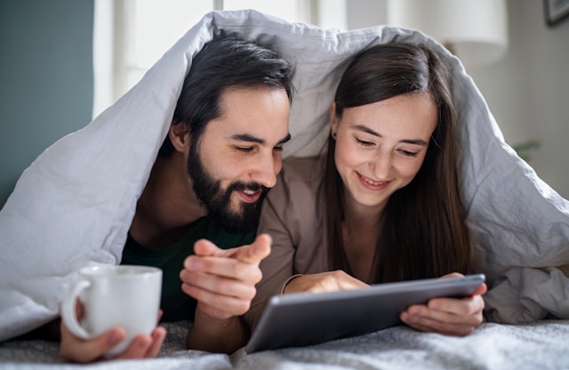 People under a blanket